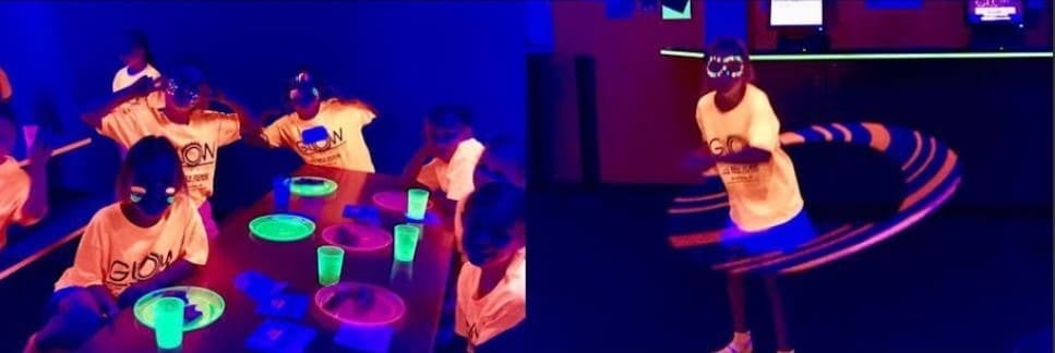 Kids celebrating a colorful birthday party with balloons and cake at AeroSports London